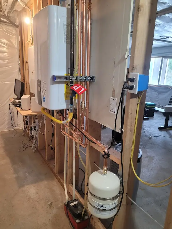 Licensed plumber repairing a kitchen sink in Mount Pleasant